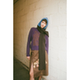 Person wearing HADES blue & brown Hooded Scarf, HADES Peaches skirt and Eternity Knit