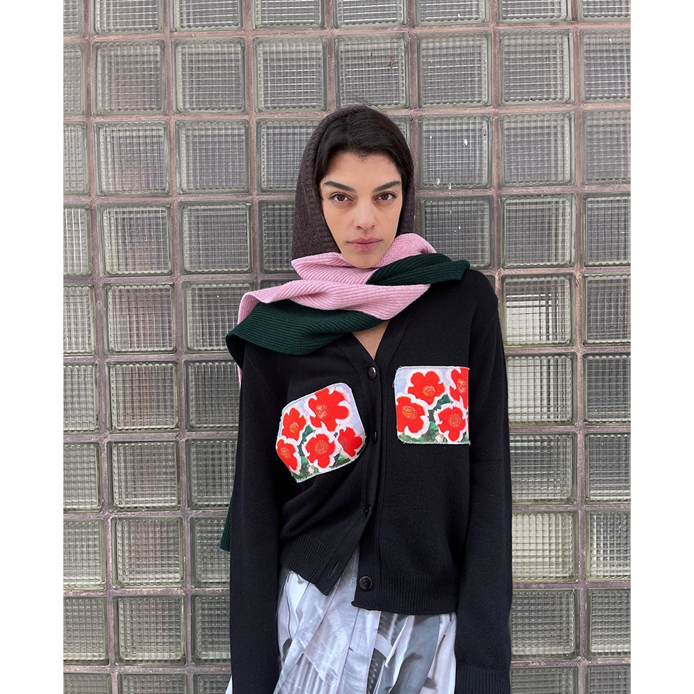 Model wearing the HADES Brown, Pink and Green Hooded Scarf with the Waves Cardigan and the Ego’s Arcady Skirt.

