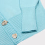 Detail flatshot of the ribbing and sleeve cuff on the 138 Cardigan.