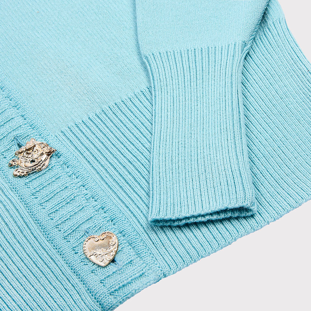 Detail flatshot of the ribbing and sleeve cuff on the 138 Cardigan.