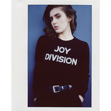 Model wearing HADES wool Joy Division sweater