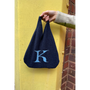HADES K letter bag held by model
