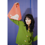 Model holding HADES Poodle Bag