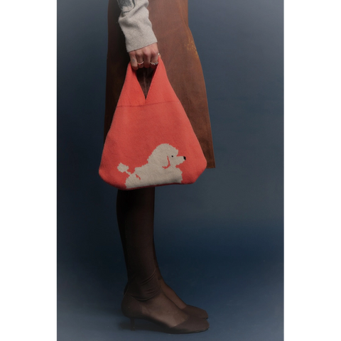 Model holding the Poodle Bag