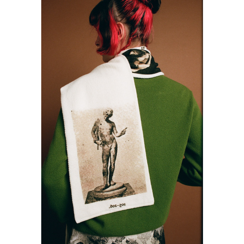 Model wearing HADES wool Narcissus Scarf back shot