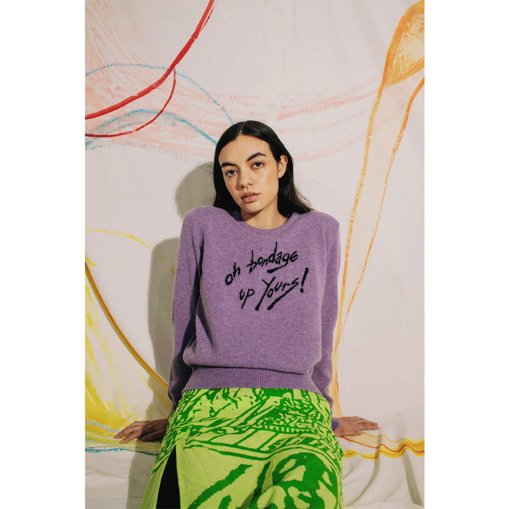 Person wearing a purple jumper with Oh Bondage Up Yours! 