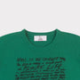 Neck detail image of the April is the Cruellest Month Knit in Jade Green & Black