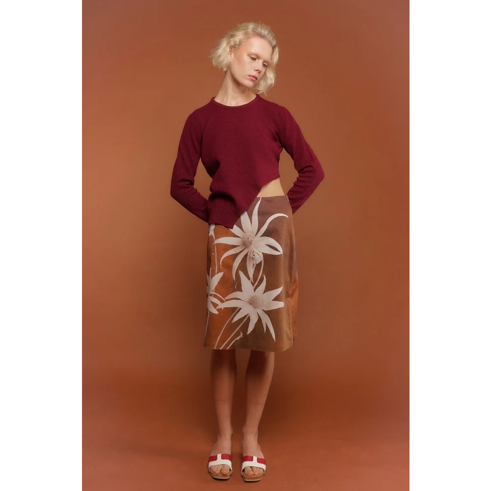 Model wearing the Hanakotoba Skirt & Blood Red Sabi Knit