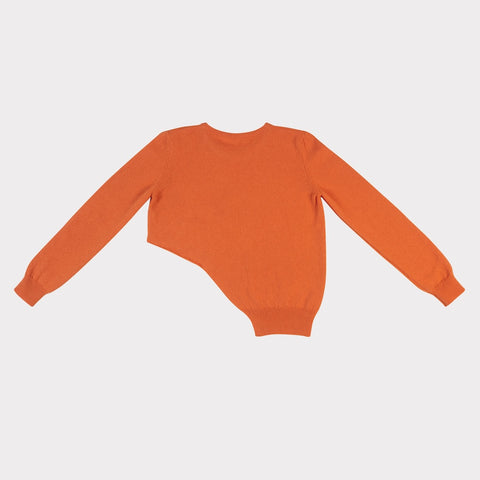 Back flat shot of the orange Sabi knit