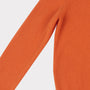 Arm flat shot of the orange Sabi knit