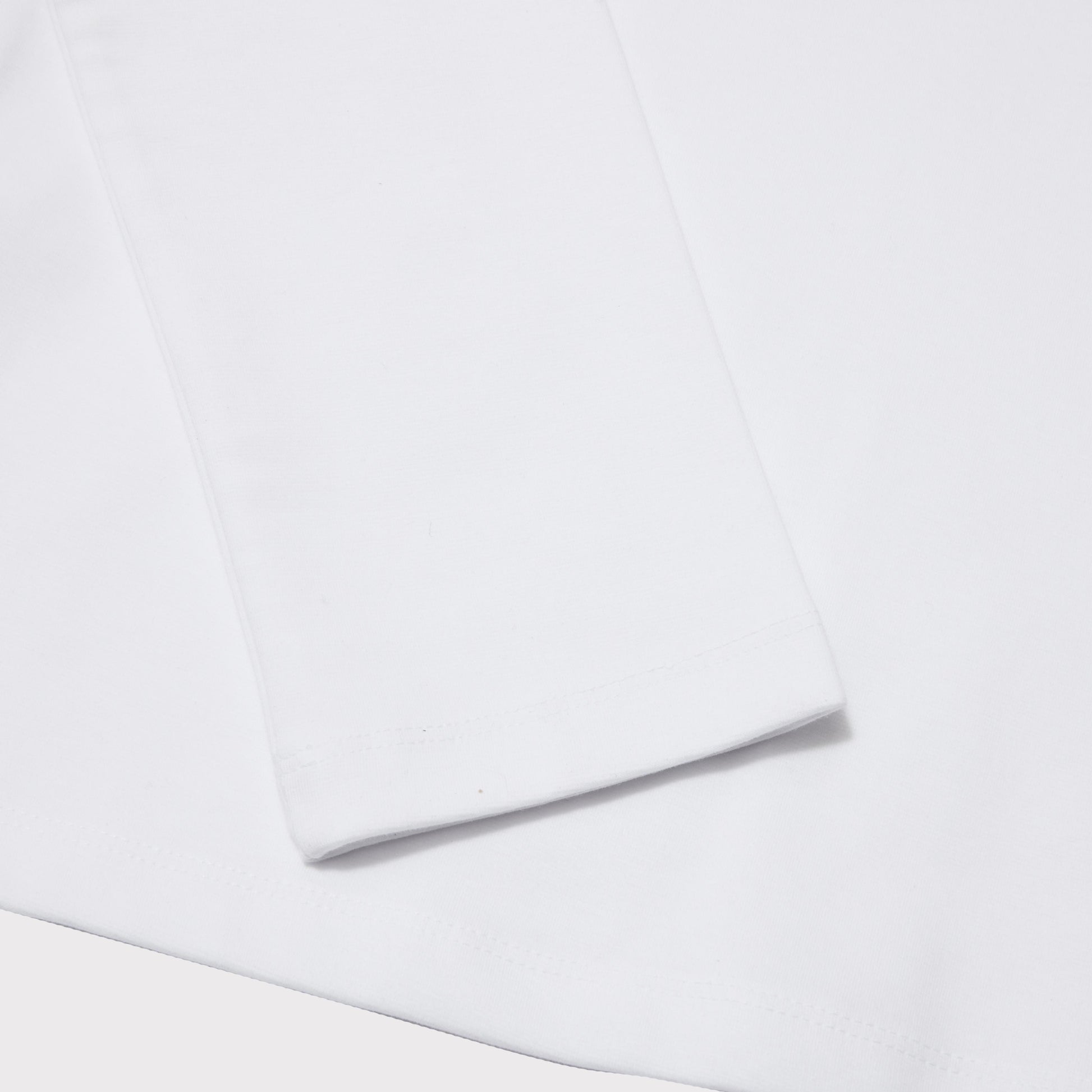 Detail flatshot of the HADES News top sleeve.