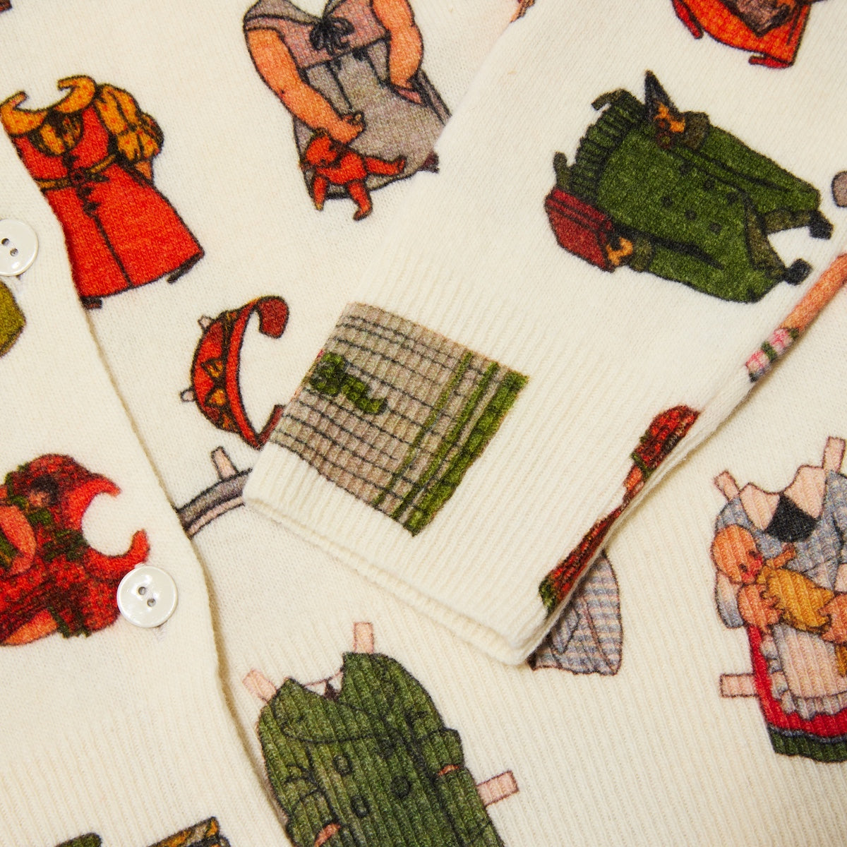 Close up photo of the Paperdoll cardigan showing the print and texture of the knit.
