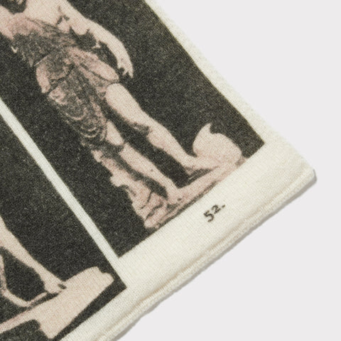 Close up shot of the digital printing featured on the HADES Narcissus scarf in Ivory and Black