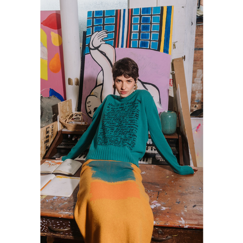 Model wearing HADES jade Manifesto Jumper