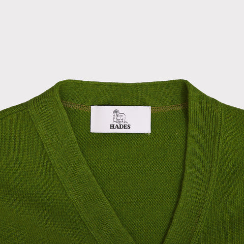 Close up of the neckline on the green Cigarette Carrington cardigan 