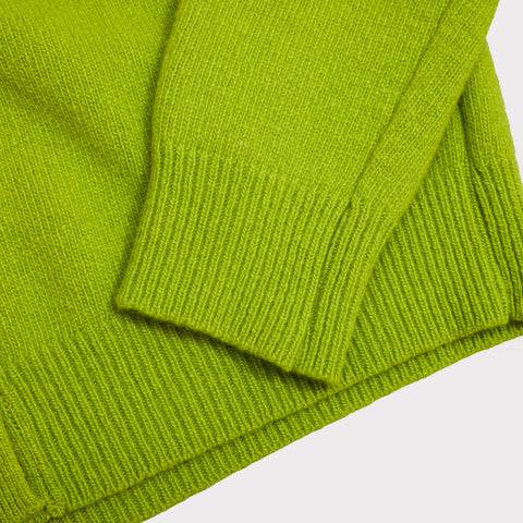 Close up shot of the sleeve and cuff details on the HADES Lime cardigan.