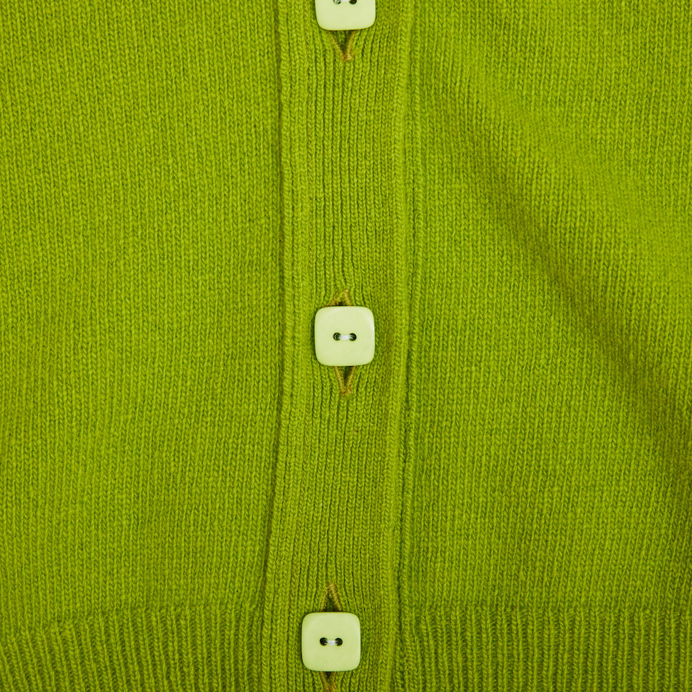Close up shot of the buttons on the HADES Lime cardigan.