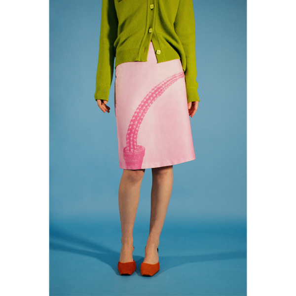 Model wearing the Phallic skirt styled with the HADES lime cardigan