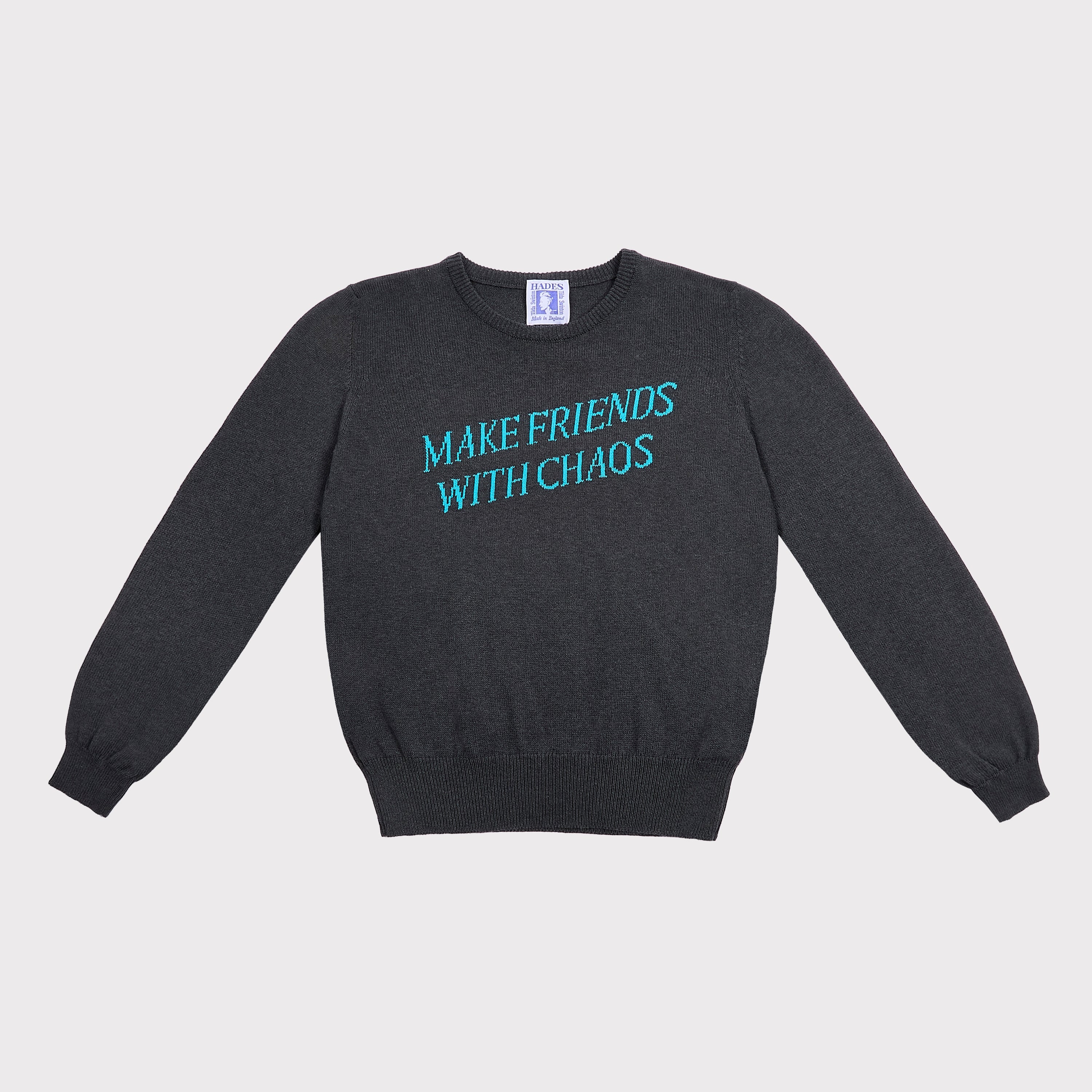Front flatshot of the "Make Friends With Chaos" knit in grey.