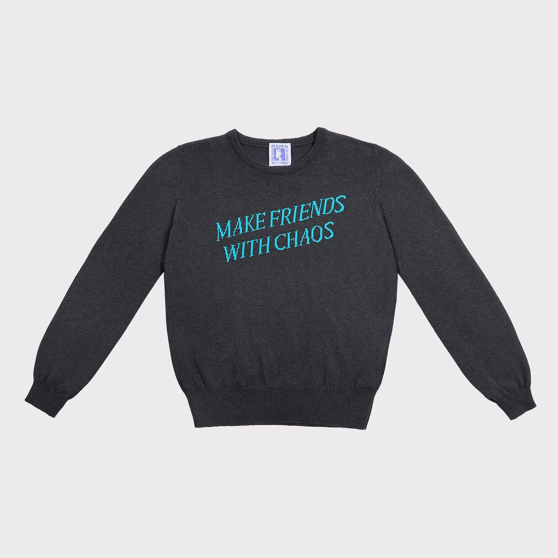 Front flatshot of the "Make Friends With Chaos" knit in grey.