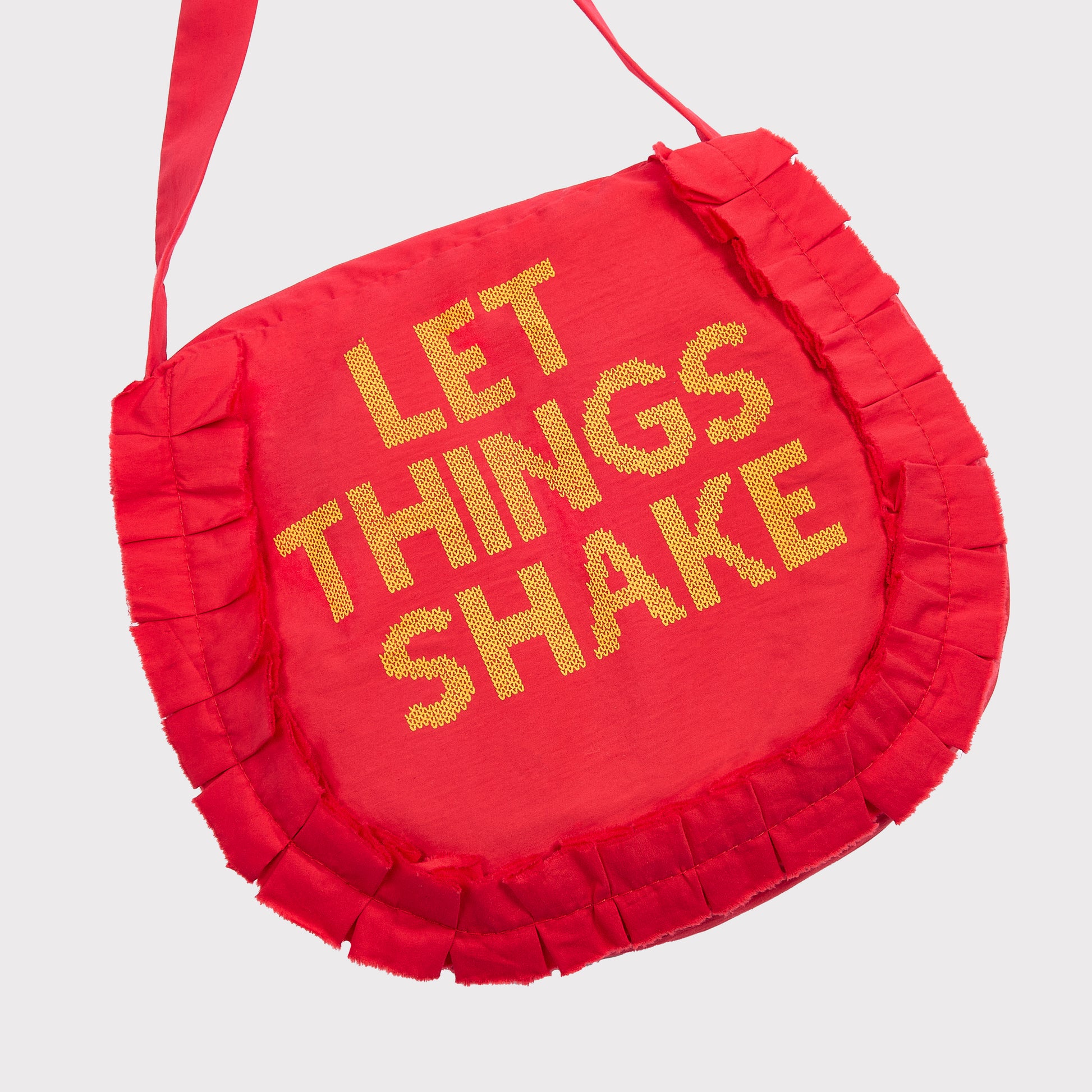Front flatshot of the "Let Things Shake" bag.