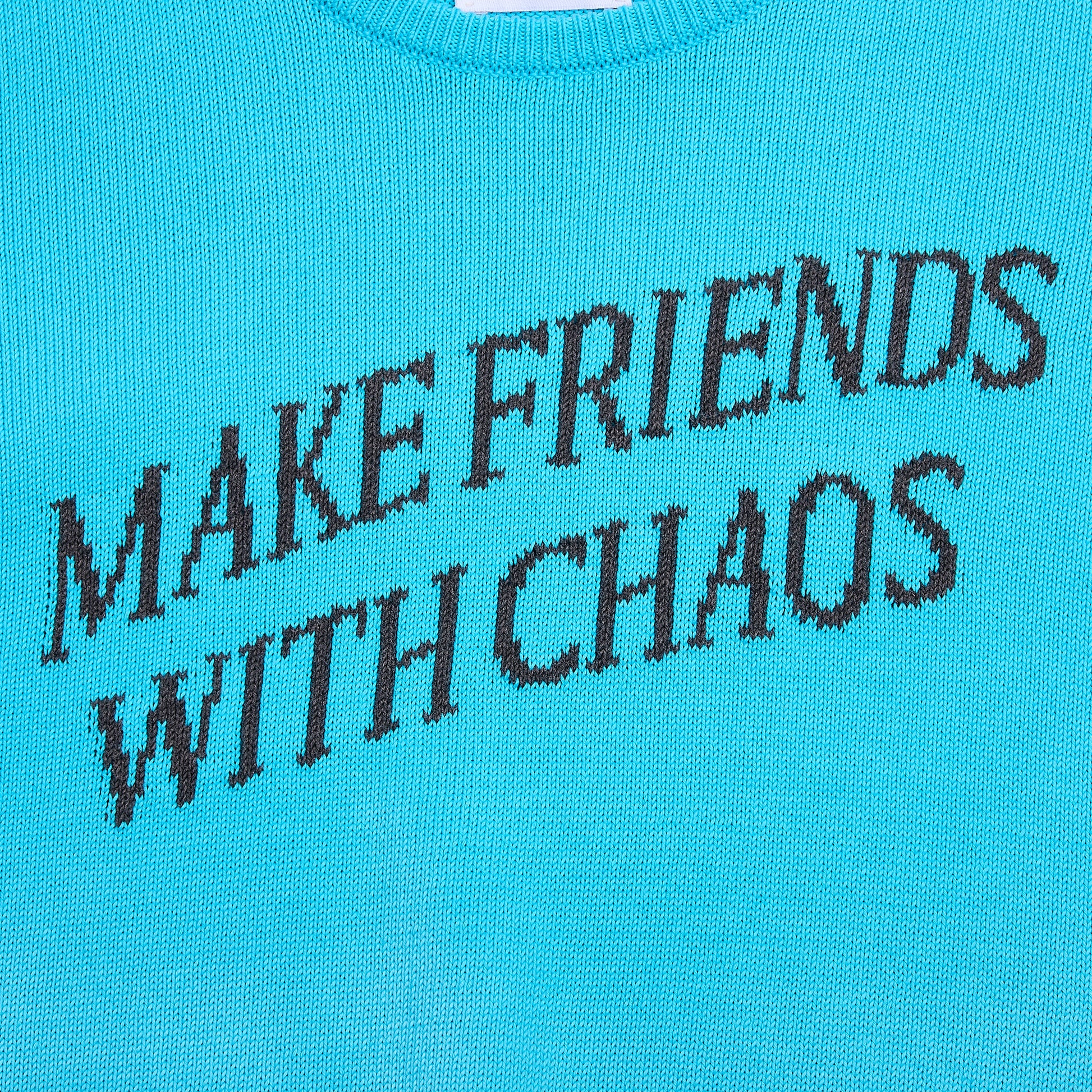 Closeup flatshot of the "Make Friends With Chaos" knit 