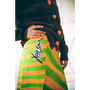 Up close shot of the model wearing the 'Day-Glo' skirt focusing on the X-Ray Spex logo