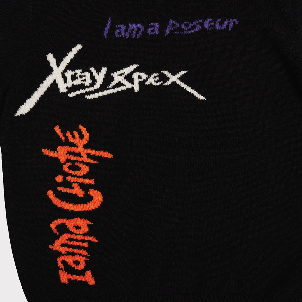 Close up of the text on the 'I am a Cliché' jumper
