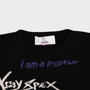 Close up of the neckline on the 'I am a Cliché' jumper