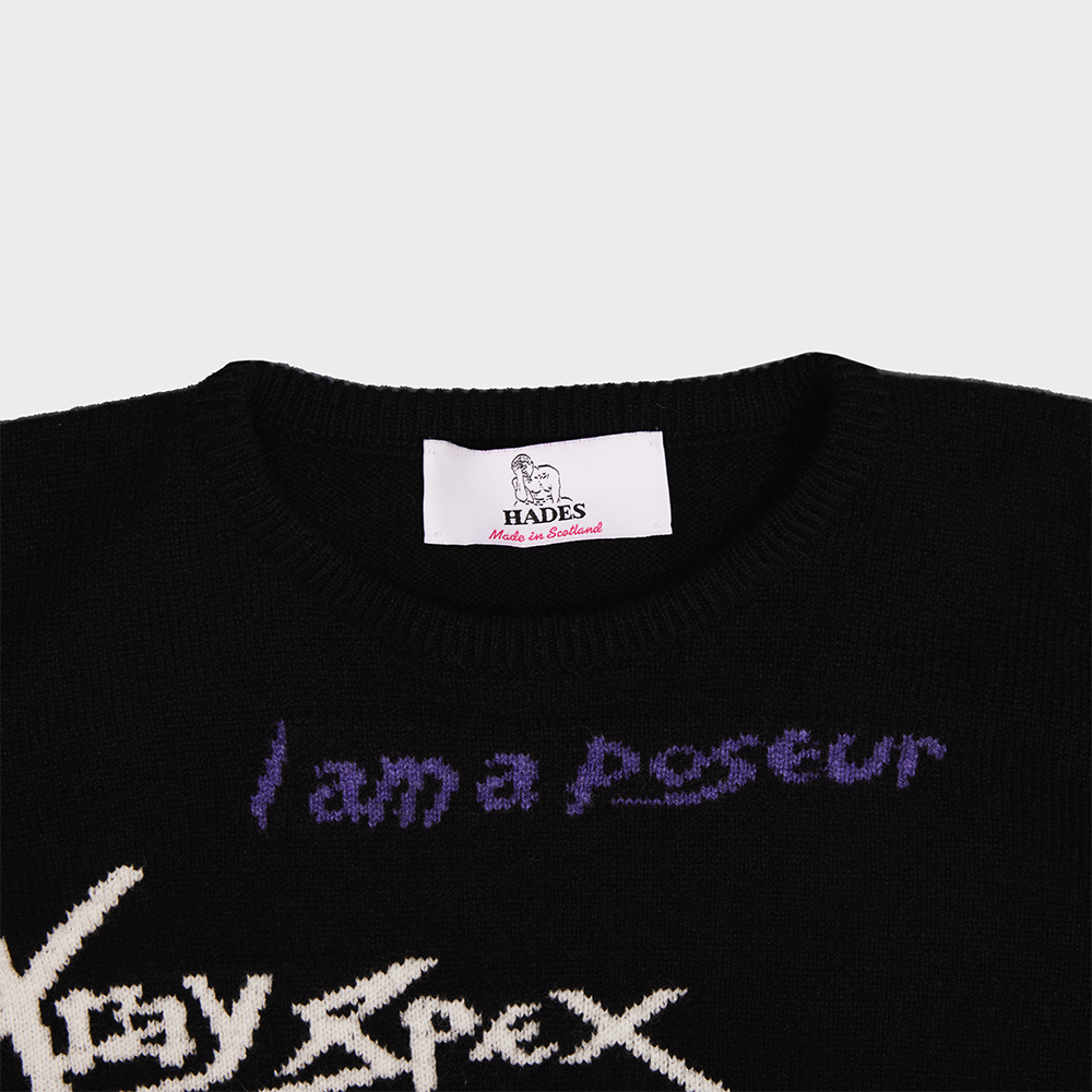 Close up of the neckline on the 'I am a Cliché' jumper