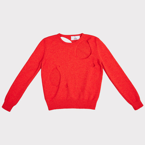 Front flat shot of the Sélavy jumper in orange