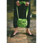 Model holding the "Make Friends With Chaos" bag.