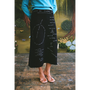 Model wearing the "Notes for Radical Living" skirt.