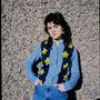 Model wearing blue floral Barbauld cardigan.