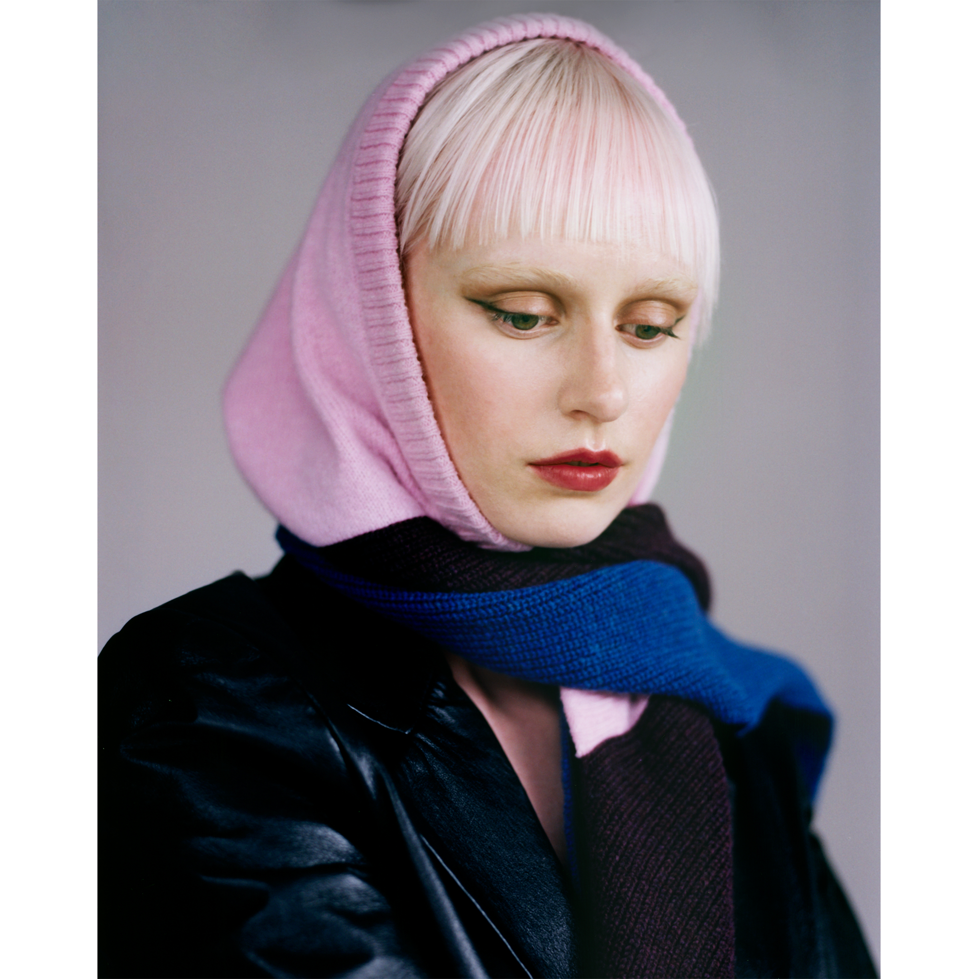 Model wearing HADES Hooded Scarf pink