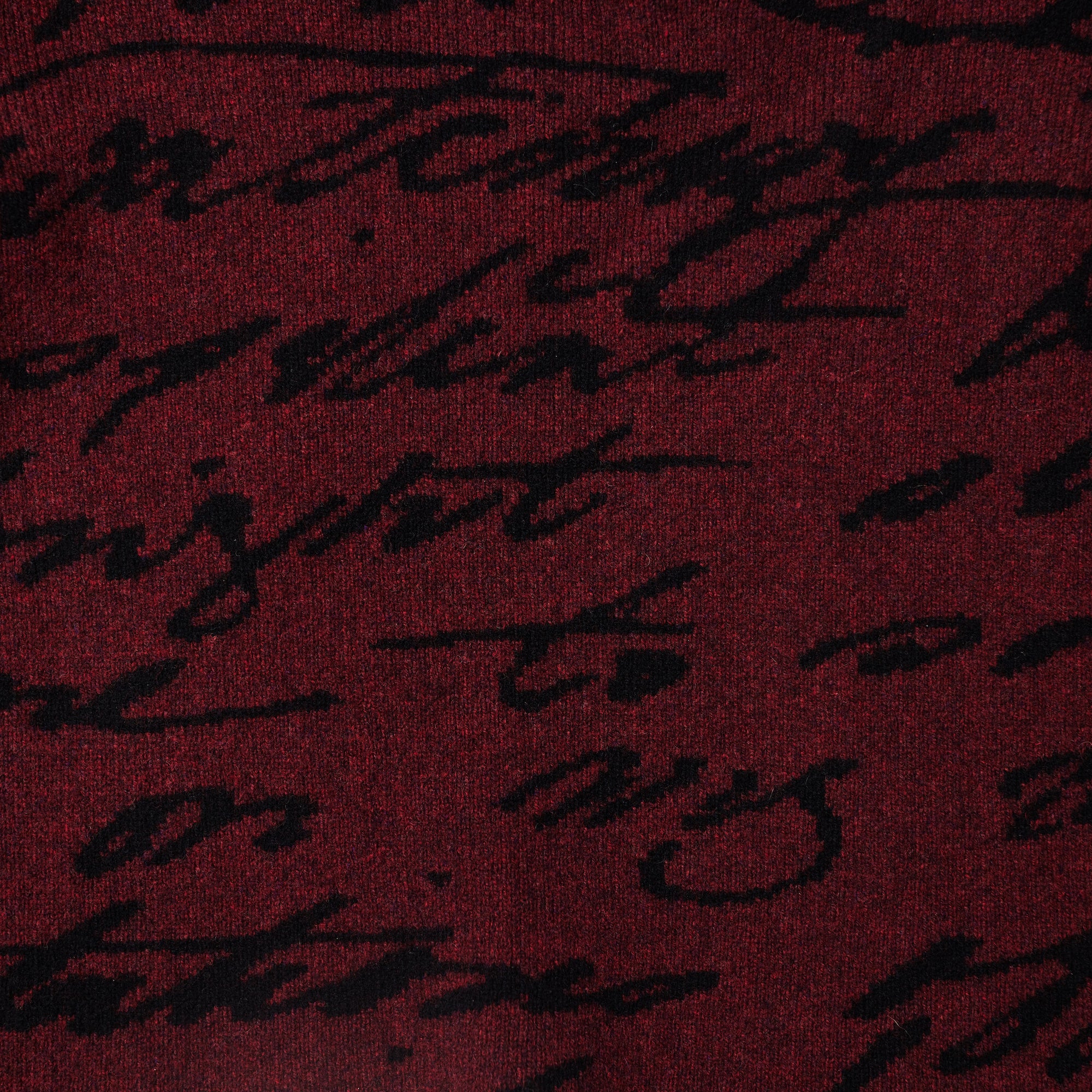 HADES burgundy and black Mary Shelley script jumper closeup